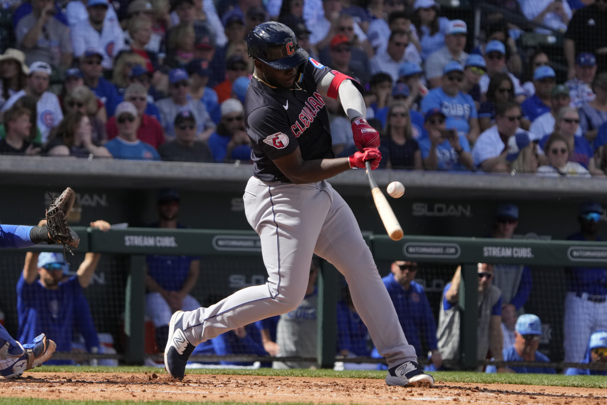 Mar 3, 2024; Mesa, Arizona, USA; Cleveland Guardians outfielder Jhonkensy Noel (78) hits a single against the Chicago Cubs in the third inning at Sloan Park.